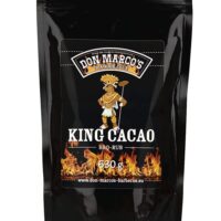 King Cacao Rub im Nachfuellbeutel, schwarzer wiederverschließbarer Beutel mit Zipper, schwarz gesleeved, Comic Pferd in Maya Outfit als Maskotchen