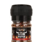 red heat steak pfeffer in transparenter PET Dose, schwarzes Etikett mit Produktname und Hörnern in Front, schwarze Deckelmühle