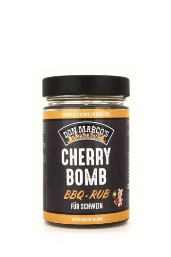 Cherry Bomb Rub in Glas Dose, schwarzes Etikett, orangener Rand und Schrift, schwarzer Blech Deckel, Don Marco's Barbecue Logo oben mittig
