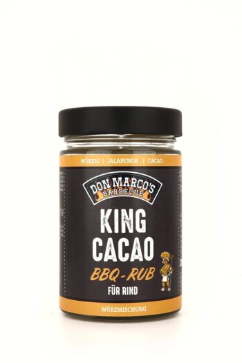 King Cacao Rub in Glas Dose, schwarzes Etikett, orangener Rand und Schrift, schwarzer Blech Deckel, Don Marco's Barbecue Logo oben mittig